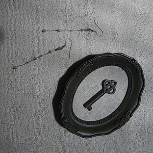 Delicate pearl drop earring with sterling silver